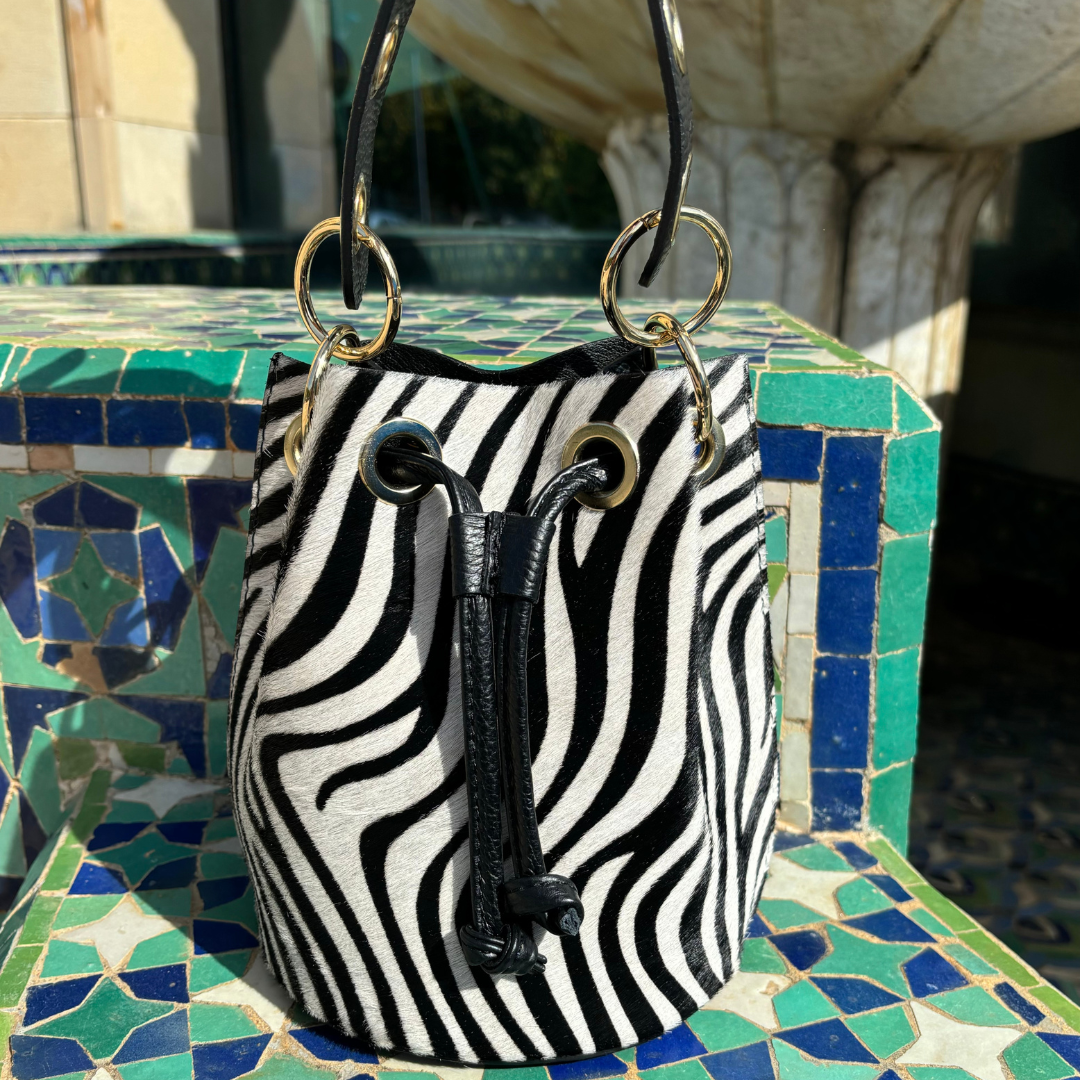 Bolso Bombonera Leda Animal Print Cebra